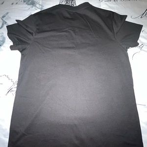 Here I'm selling a red and black shirt from SHEIN.